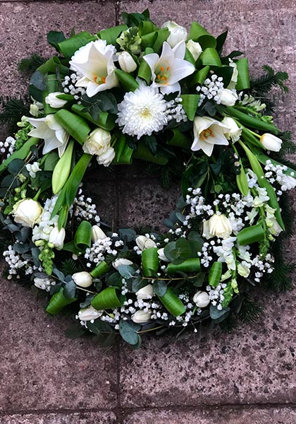 Beställ blommor till begravning i Lomma