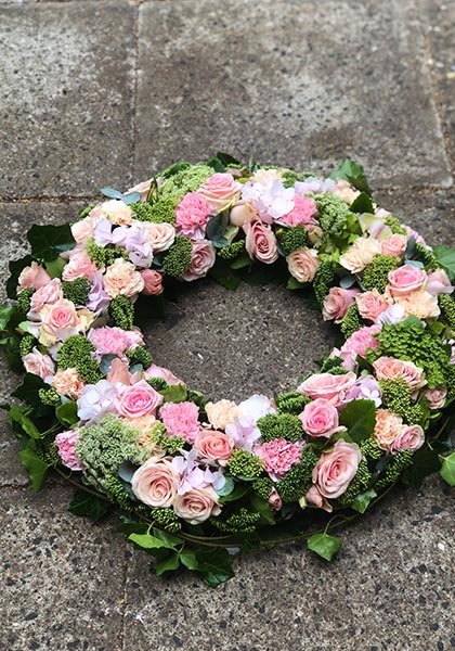 Beställ blommor till begravning i Lomma