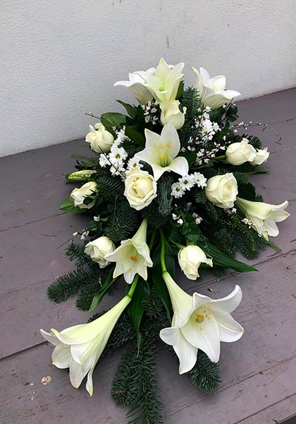 Beställ blommor till begravning i Lomma