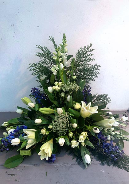 Beställ blommor till begravning i Lomma