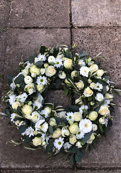 Beställ blommor till begravning i Lomma